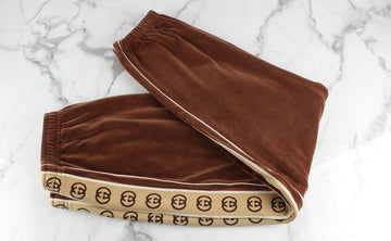กางเกงวอร์มหลวม Gucci - SKU12345