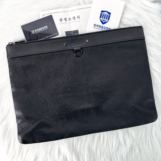 Louis Vuitton Shadow Discovery Monogram Clutch M62903 125110231