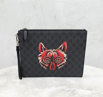 กระเป๋าคลัตช์ Gucci GG Supreme Woolf Strap Clutch - SKUXXXX